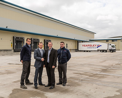 1.	Yearsley Logistics Director, Harry Yearsley takes over the newly completed unit from Russells construction MD, Andrew Russell.