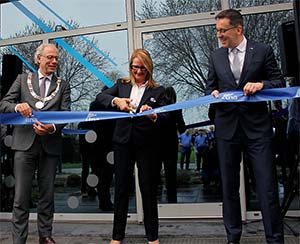 tna ribbon cutting in holland